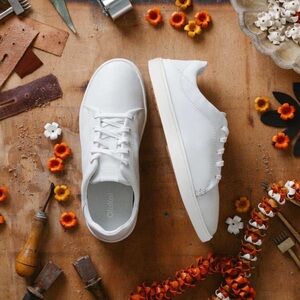 Women’s Olukai Pehuea Lī ‘Ili White Leather Sneakers